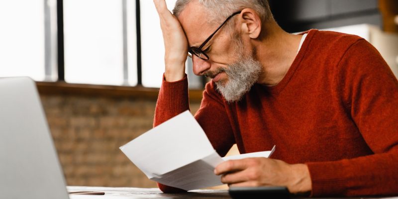 Expensive charges on domestic bills. Loan, debt, bunkruptcy concept. Dismissal, depression